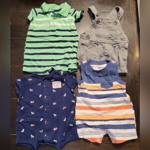 Carters Newborn 4 piece romper set